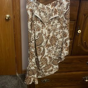 Cream, paisley, print longer on one side than the other skirt zip closure